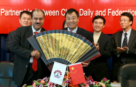 National paper nets deal with Arab board