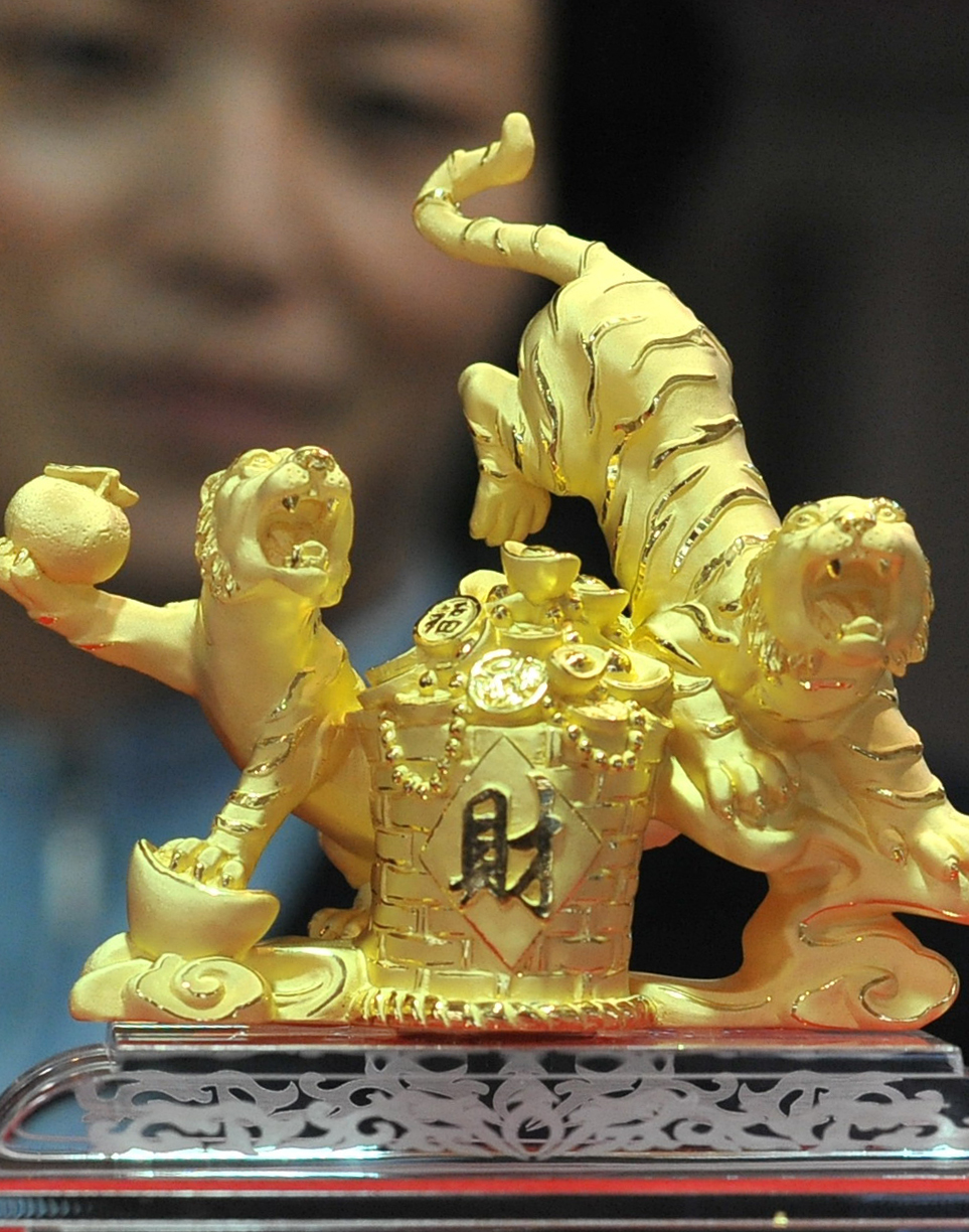 Gold tiger sculptures on sale