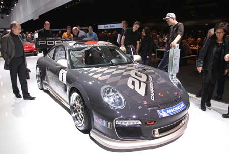 Porsche reports loss on merger