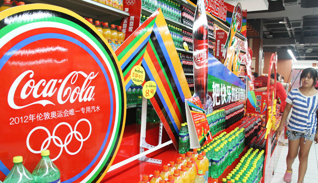 Coca Cola sorry over handling of drinks scare