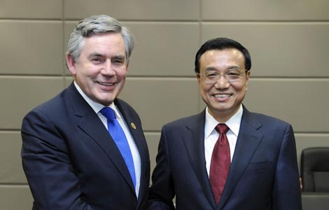 Premier urges China-UK co-op on int'l affairs