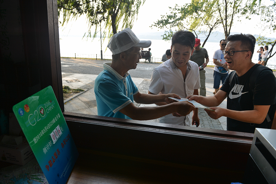 64-year-old volunteer serve tourists before G20 summit