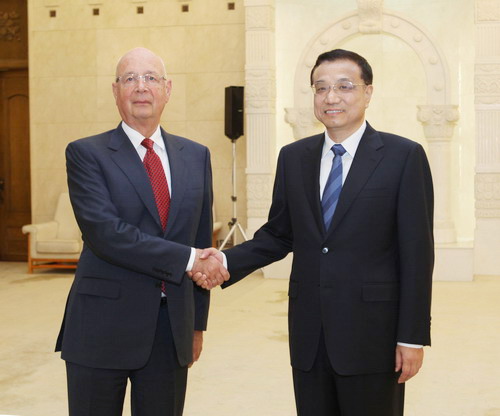 Li urges cooperation in global crisis