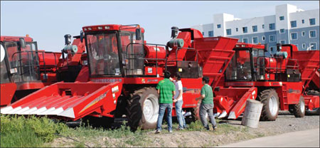 Farm machine maker looks to greener pastures