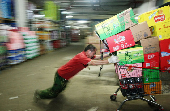 People stock goods for fear of heavy rain