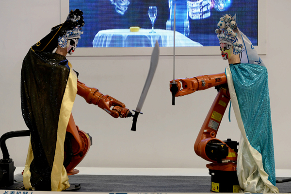 Robots dance it up at metal exhibition