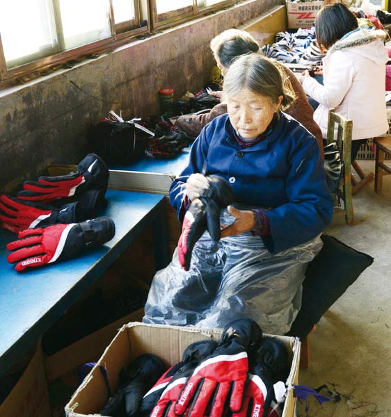 Many hands make light work in glove firm