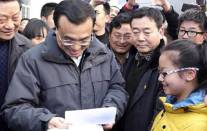 Go global, Premier Li tells domestic courier