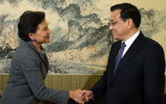 Chinese premier meets Kerry on trade, energy