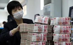 Economic slowdown, US QE tapering frustrate strong yuan