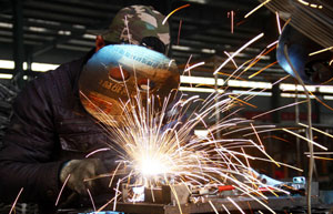 Services mitigate manufacturing malaise