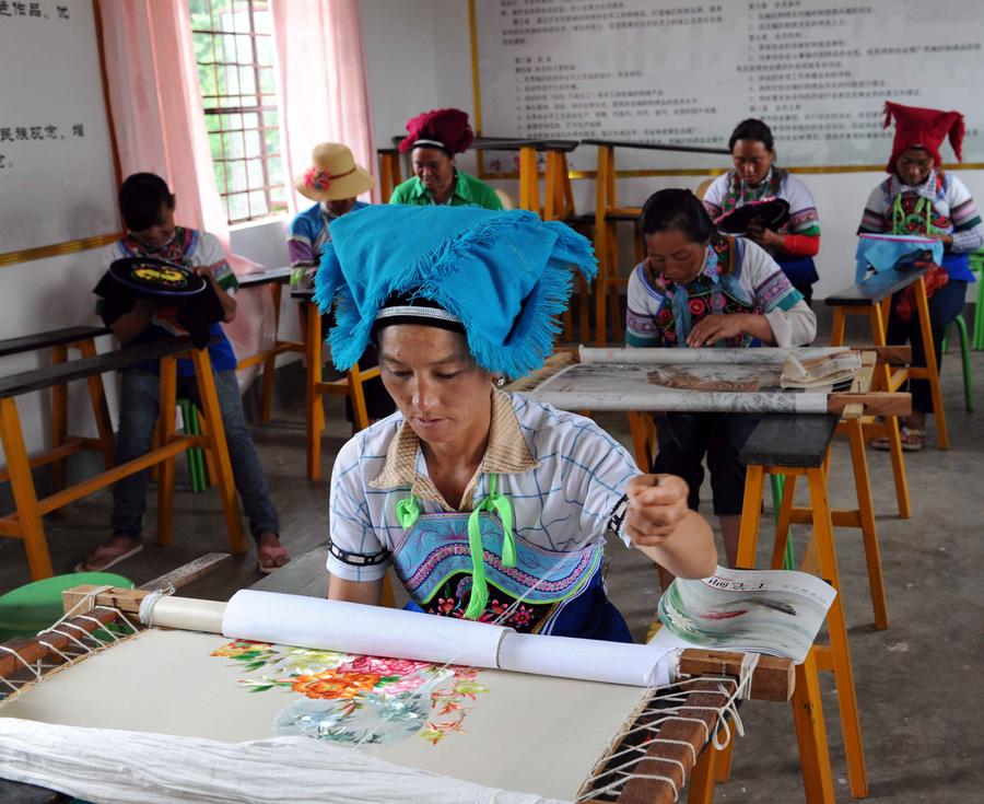 Weaving profits, tradition with hand-made dresses