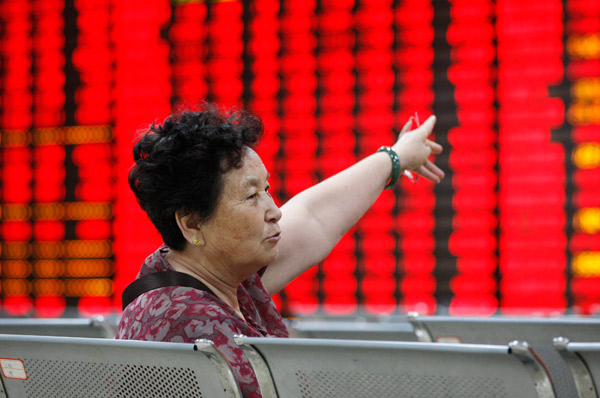 China shares close at highest since December