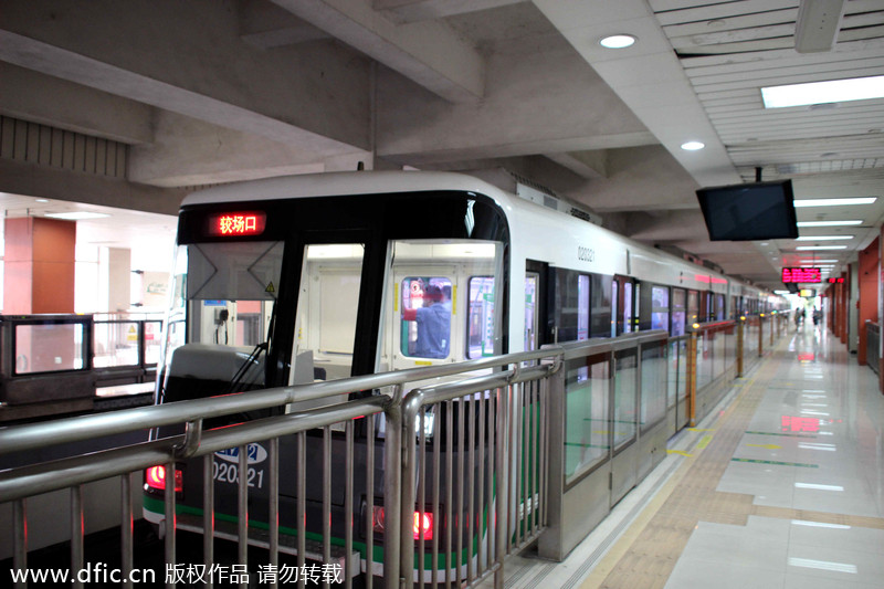 Light rail pass through building in Chongqing