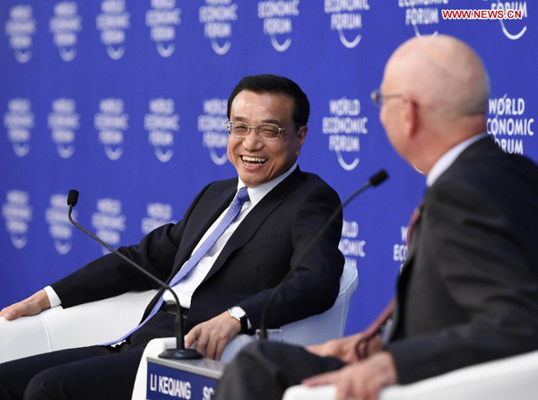 Chinese premier reassures world CEOs of growth