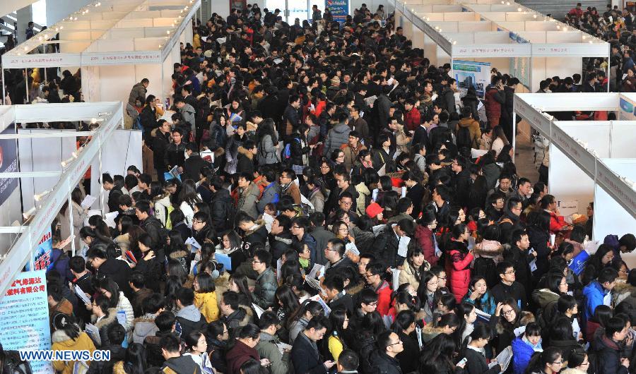 Job seekers attend job fair for postgraduates in Beijing