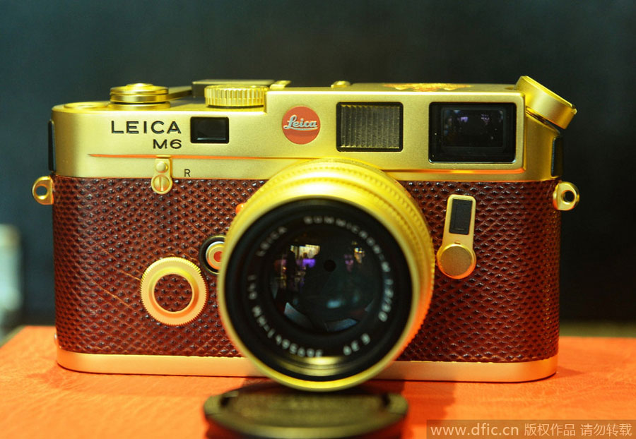 Gold plated leica cameras on display