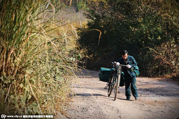 Last of the tribe: Postman on bicycle