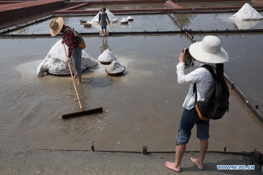 Tourists visit Cigu Saltern in Taiwan