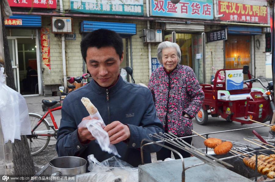 The dual life of a coke oven cleaner in Henan[5