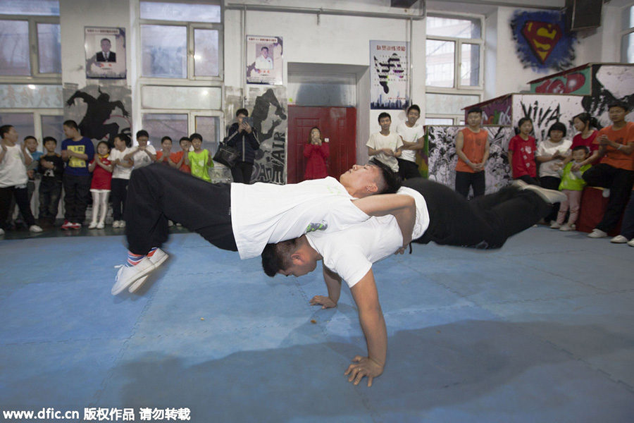 Man jumps, vaults, climbs to make his dream come true