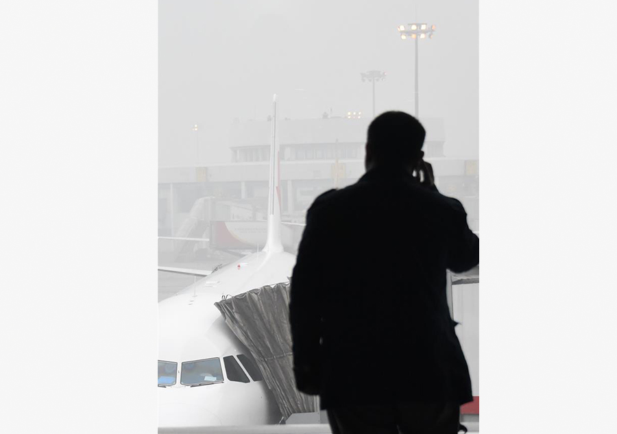 Flights delayed due to orange alert smog at Beijing Airport