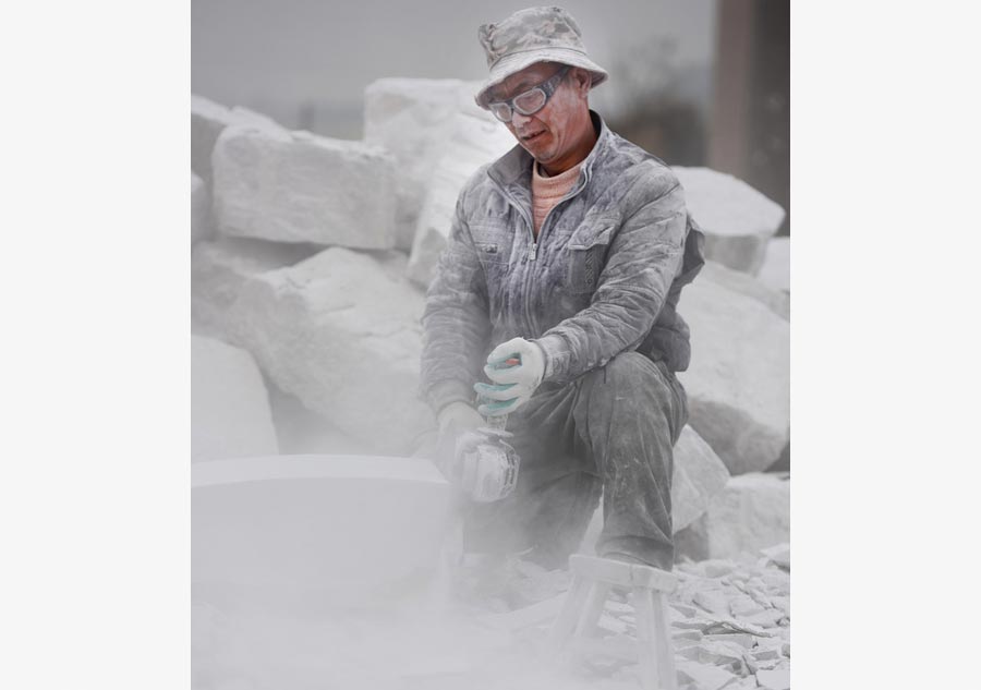 The snowy world of a tombstone carver