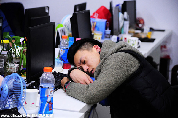 China tech workers asleep on the job - with the boss' blessing