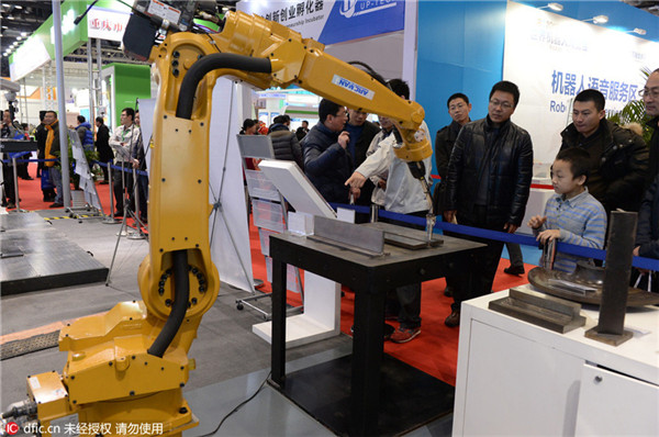 Foxconn replaces 60,000 workers with robots