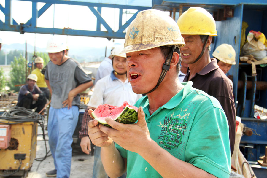 Working under the scorching sun