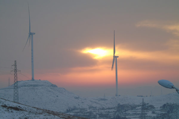 Apple partners with Chinese wind-power company to further cut carbon emissions