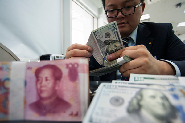 Renminbi steadier as central bank's remedies take hold