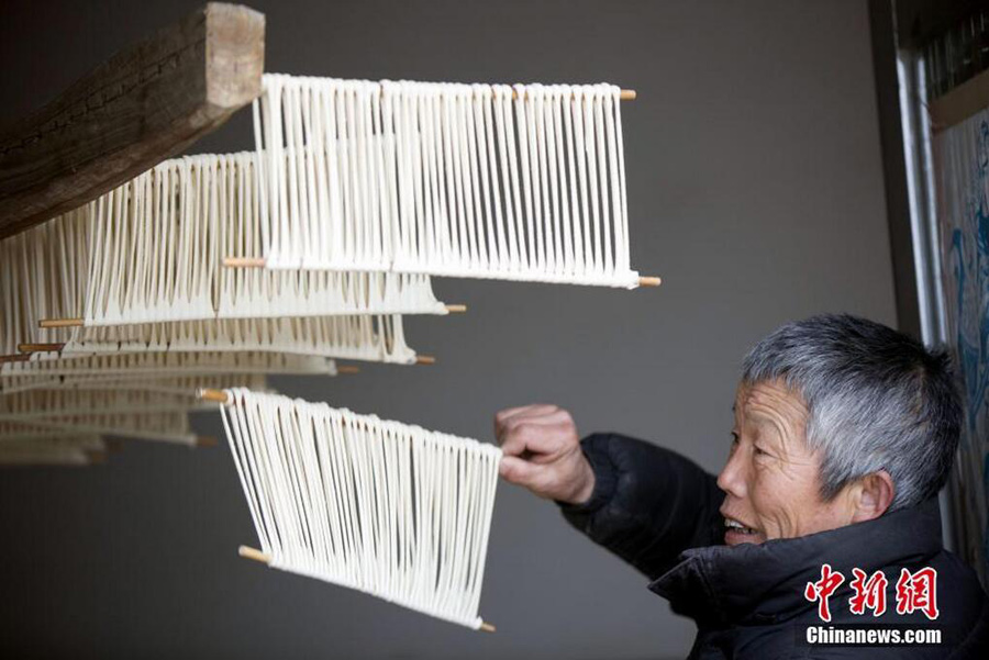 Handmade noodles to greet Spring Festival