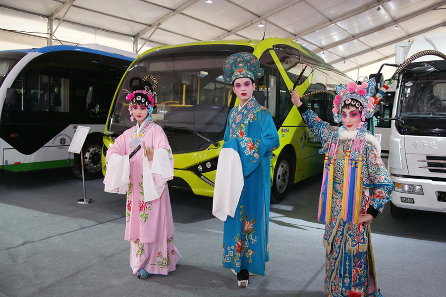 Tradition meets technology: Wu Opera performers take over car show