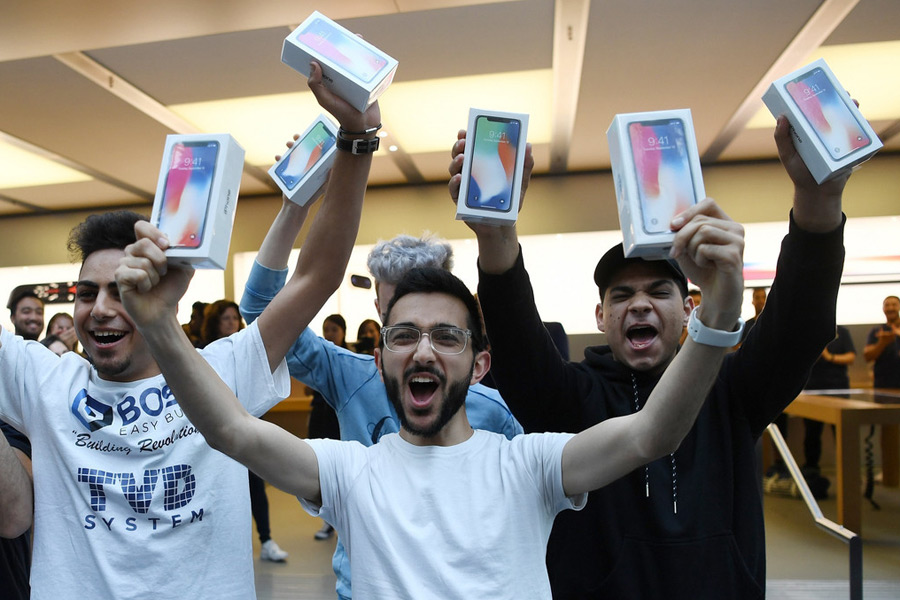 Apple fans around the world line up for iPhone X