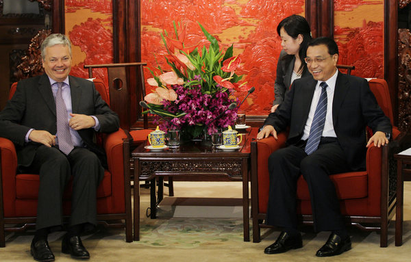 Li pledges to help solve debt crisis