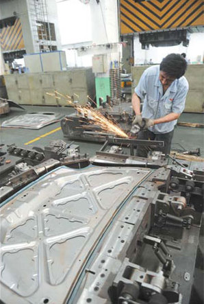 In spite of slowdown in sales, parts makers still investing