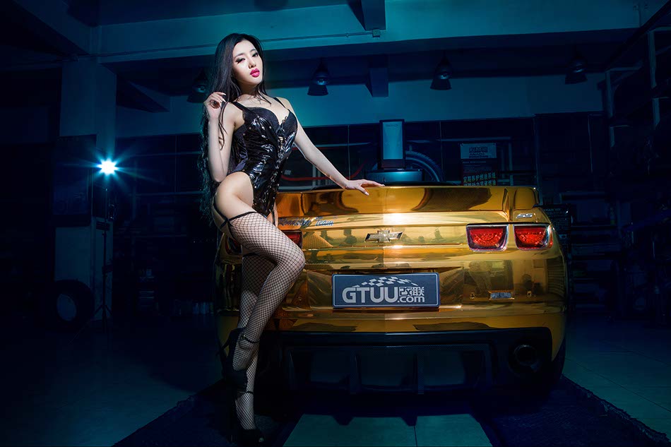 Model with modified Chevy Camaro