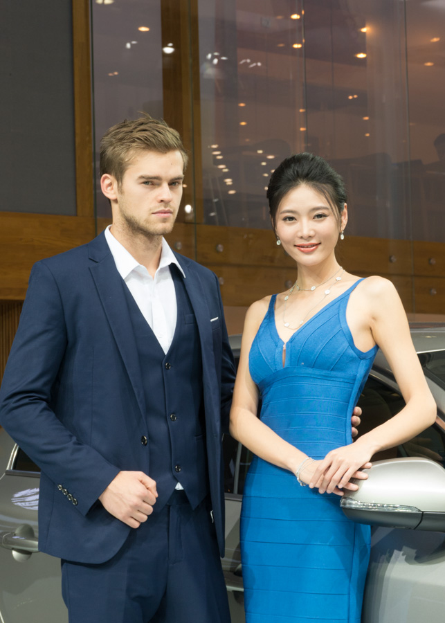 Models at Volvo pavilion at 2013 Guangzhou auto show