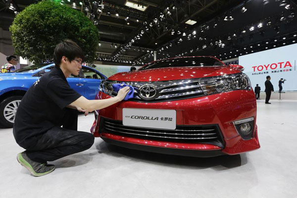 Toyota to launch China-made Corolla, Levin hybrids in 2015