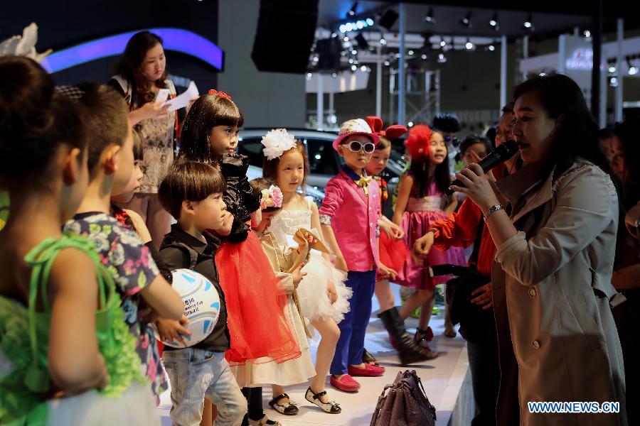 Adorable kids model at Taiyuan auto show