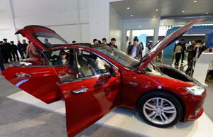 Tesla, China Unicom to build charging outlets across China