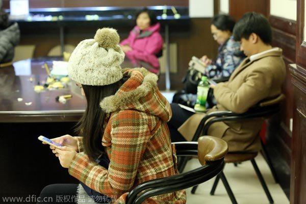 People line up for license plates in Shanghai