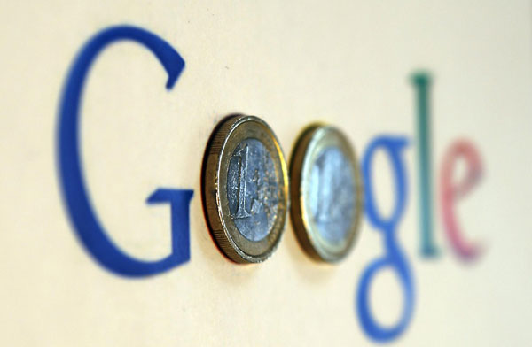 Google shares break $1,000 barrier