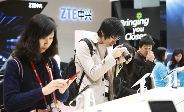 ZTE reports swing to profit in 2013