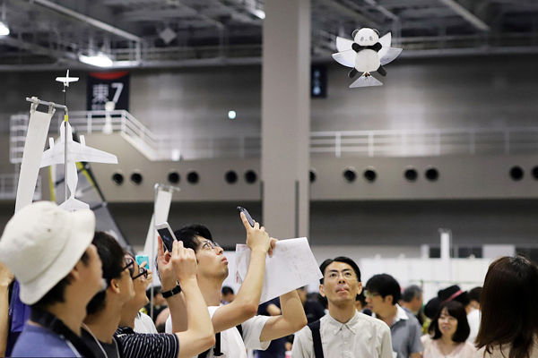 A panda-shaped drone draws attention at Maker Faire