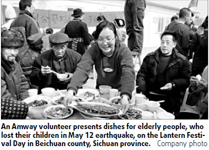 Amway staff do their bit for quake victims