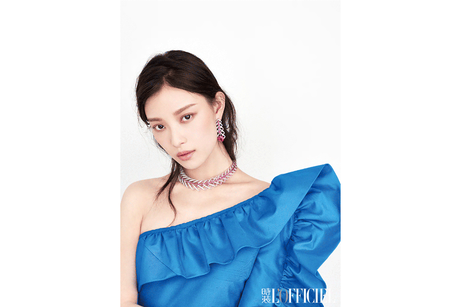 Actress Ni Ni poses for fashion magazine