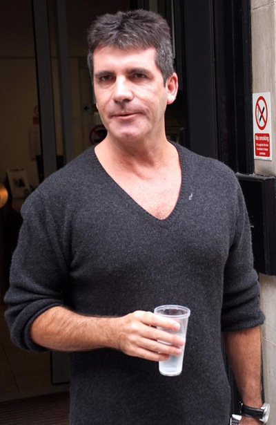 Simon Cowell robbed by one-night stand woman