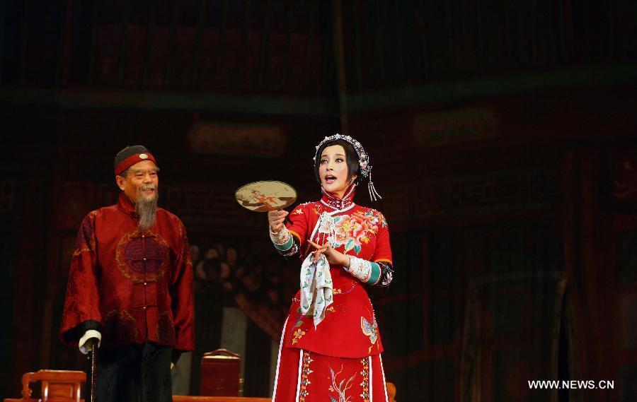 Actress Liu Xiaoqing performs stage drama